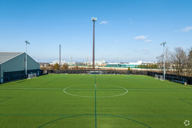The outdoor game pitch at YSC Academy awaits Spring's warmer days.