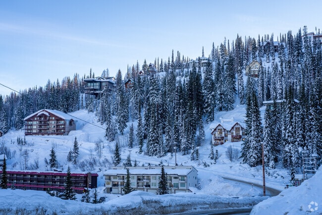 Many mountain homes like these are for sale near Schweitzer Resort.