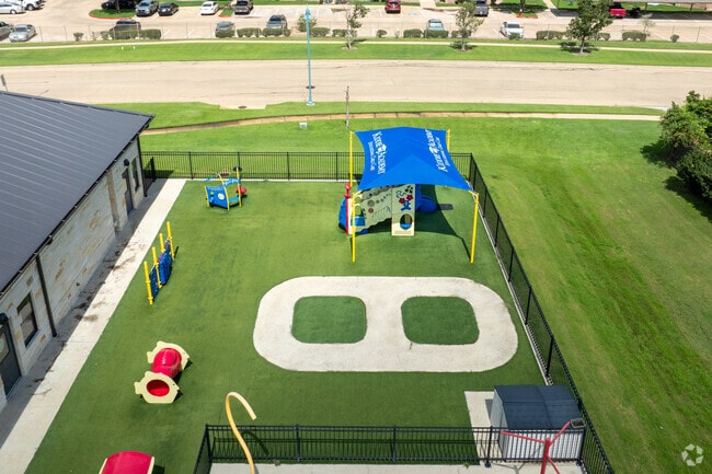 Students connect and play together during  Kiddie Academy of Bryan's recess.