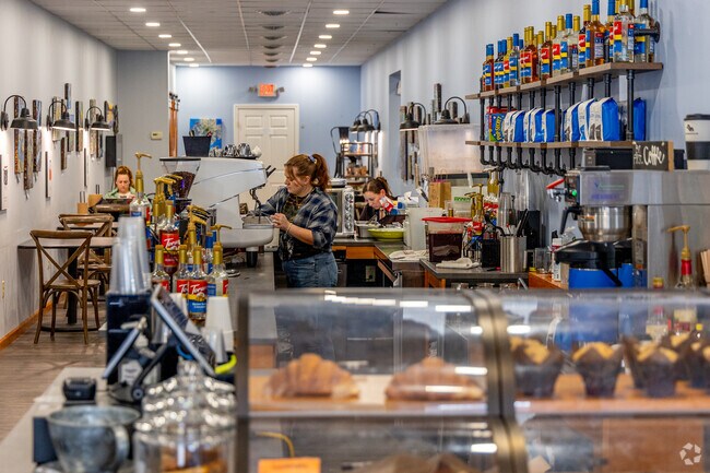 Brushes and Beans Cafe, near Plum, offer coffee on one side and painting on the other.