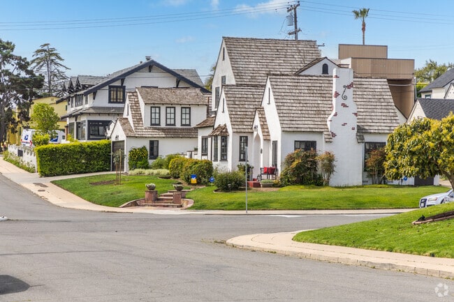 Loma Portal features historic homes with steep pitch tudor style roofs.