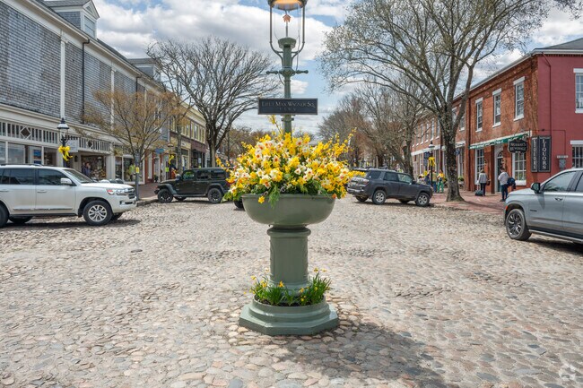 The Nantucket Garden Club decorates the Lieutenant Max Wagner Monument in preparation for the Daffodil Festival in Nantucket.