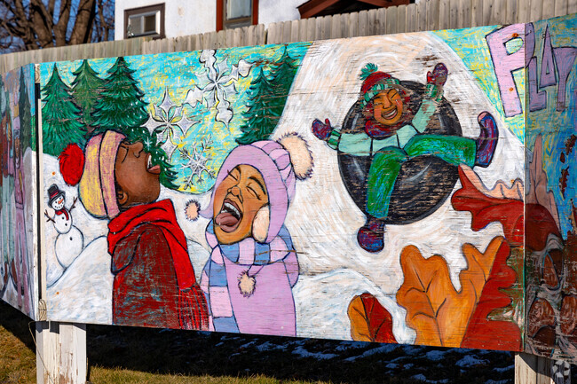 Colorful murals welcome residents and visitors to the Folwell neighborhood.