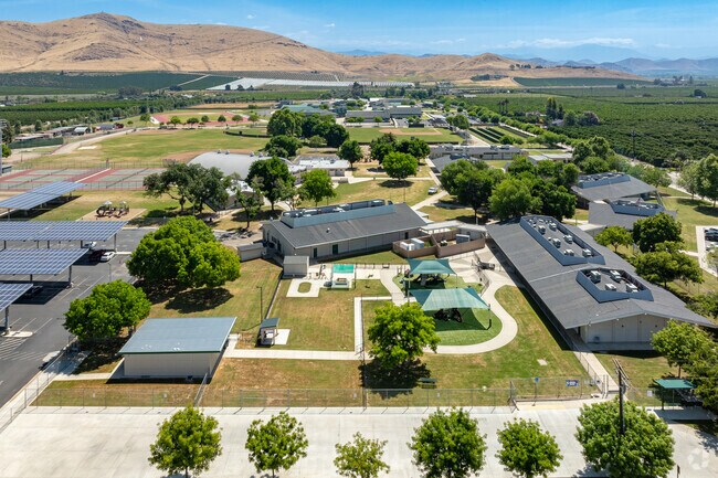 The Sierra Nevada foothills overlook the campus of Kennedy Elementary School.