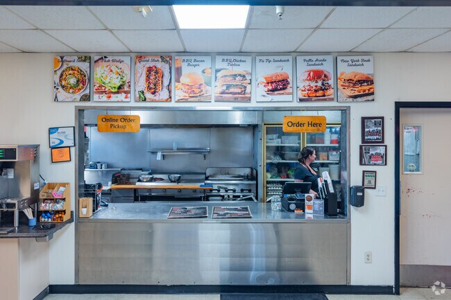 Order a BBQ bacon burger at T&A Cafe in River Road.