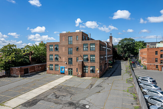 The Renzulli Gifted and Talented Academy has a large parking lot and activity area.