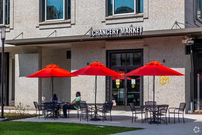 People dine outside the Chancery Market during a lunch break in Midtown Brandywine.