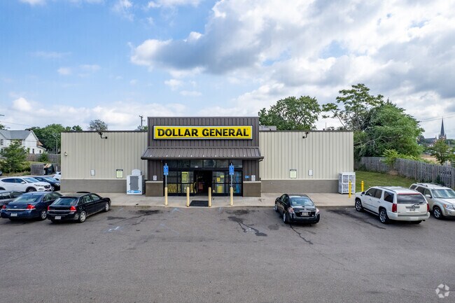 Whittier Park has a few stores within walking distance and there are more downtown.