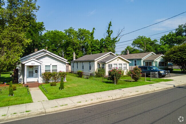 Many homes in the Greenway neighborhood have well-manicured front yards.
