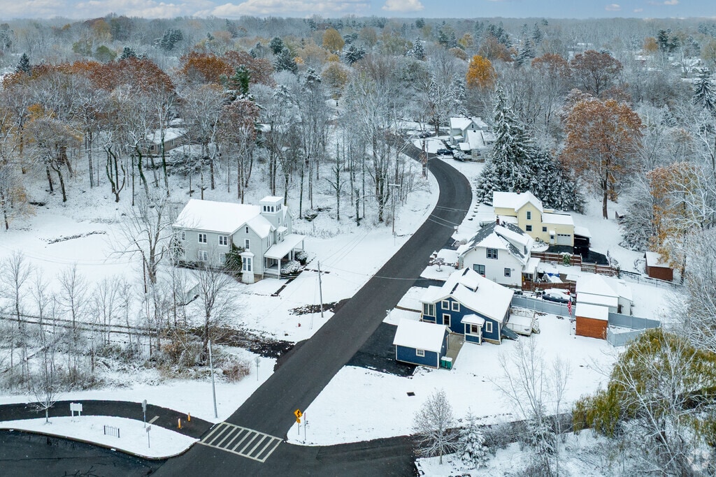 Clarence neighborhood homes have spacious lawns on safe, clean streets.