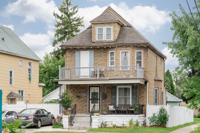 Front porches and second-floor balconies are often decorated with flowers and sitting areas