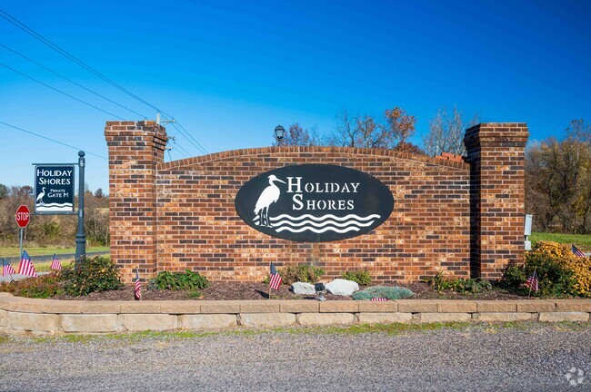 Holiday Shores is a nice area with beautiful homes and a lake to enjoy various water activities.
