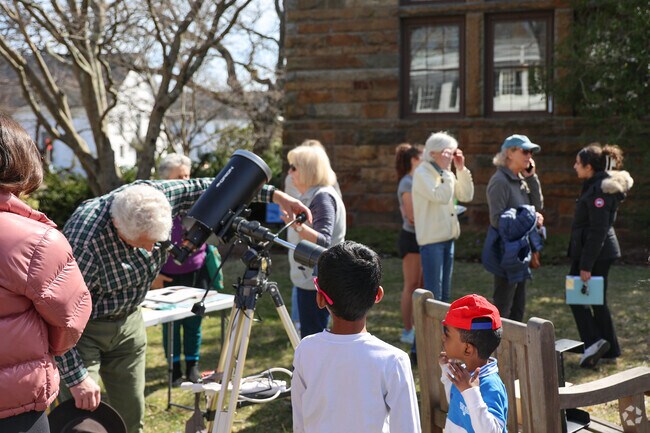 The Manchester-by-the-Sea community gathers together at the Library to view the solar eclipse.