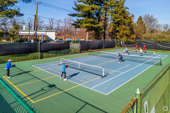 Gather some friends to play tennis at the YMCA pickleball courts near the Wyngate neighborhood.