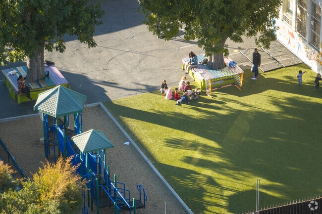 Kids playing in the playground in Larchmont Charter School