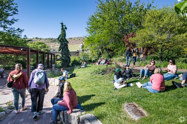 Enjoy time with friends on the hill of the Botanical Gardens at the Flower Power Happy Hour.