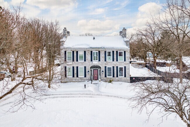Some historic stone colonial homes in Watertown like this one were imported from Ireland, and re-assembled brick by brick.