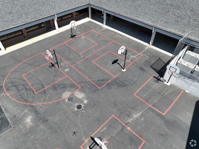 Adams Elementary School's campus also features a basketball court.