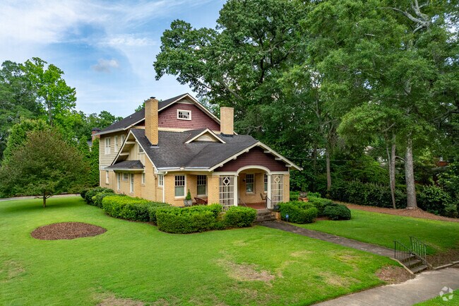 This storybook craftsman cottage showcases the character and architectural heritage of the Winnona Park Historic District.