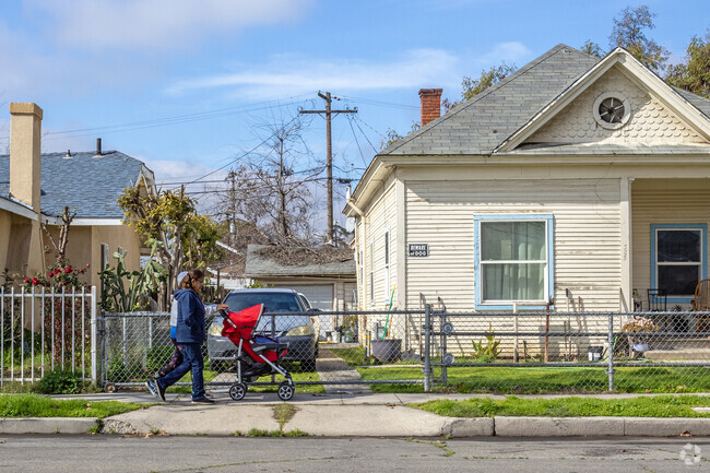 Residents enjoy morning walks on the sidewalks of the Lowell neighborhood.