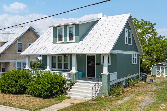 Bungalows in Waterman often have wide front porches with large overhands to beat the heat.