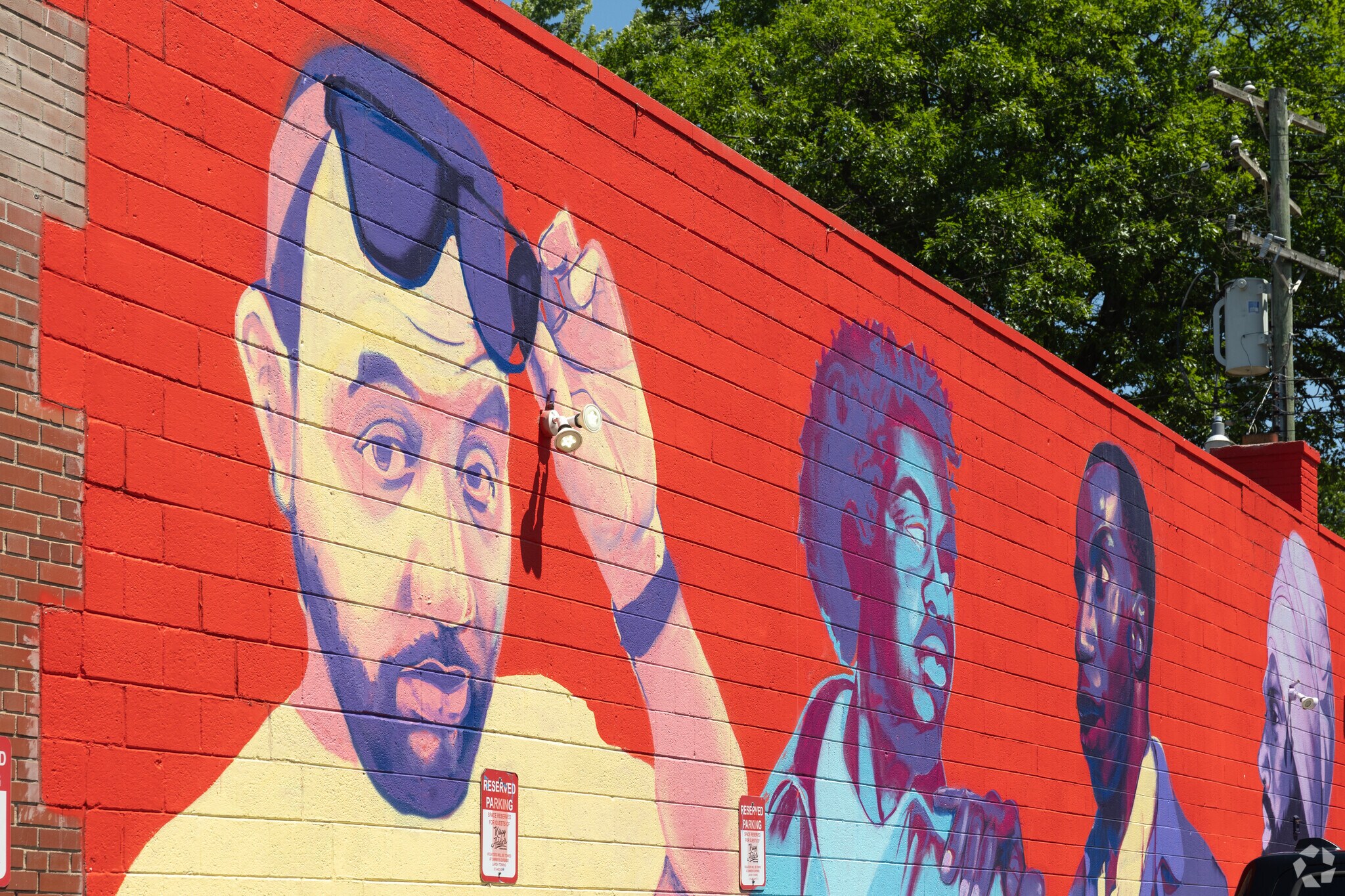 Colorful murals can be found along the Avenue of Fashion, on the border of Green Acres.