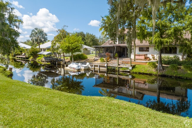Dreamlike canals run through the backyards of homes in Alva.