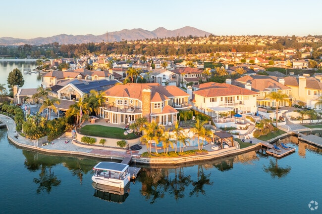 Homes around Lake Mission Viejo can be large and luxurious with private docks and boats.