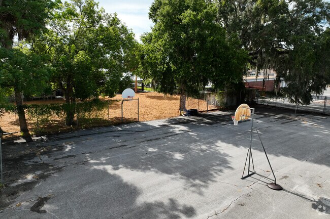 Students of Ambleside School Of Ocala can play basketball outside.