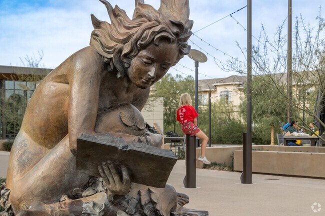 Families are welcomed by the whimsical statue of the Yorba Linda Library.