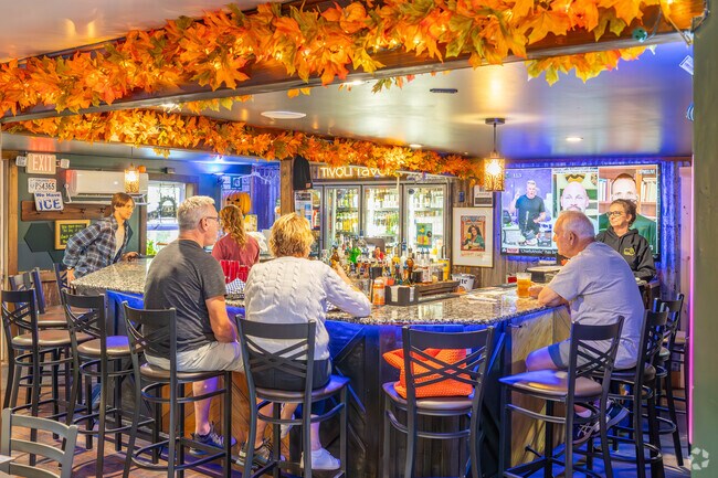 Enjoy a drink and a bit while watching the game at Tivoli Tavern near Picture Rocks.