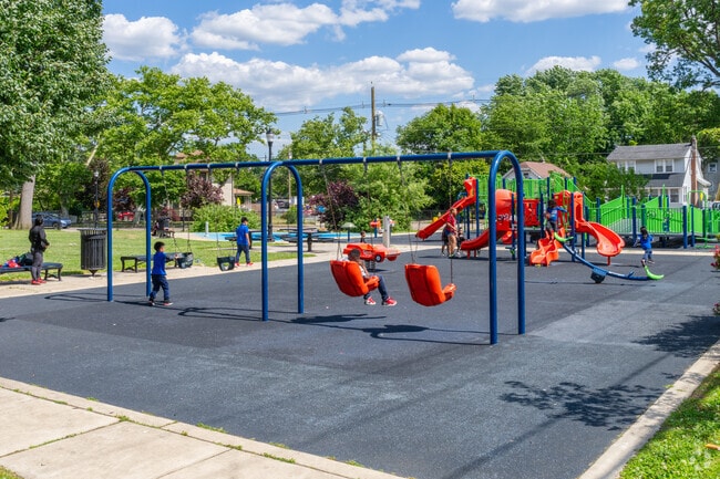 Children love the pocket park of Alberta Woods and its exciting and new playground.