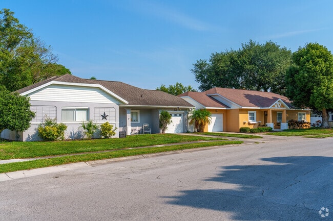 Clean, crisp landscaping accents this row of Southport homes.