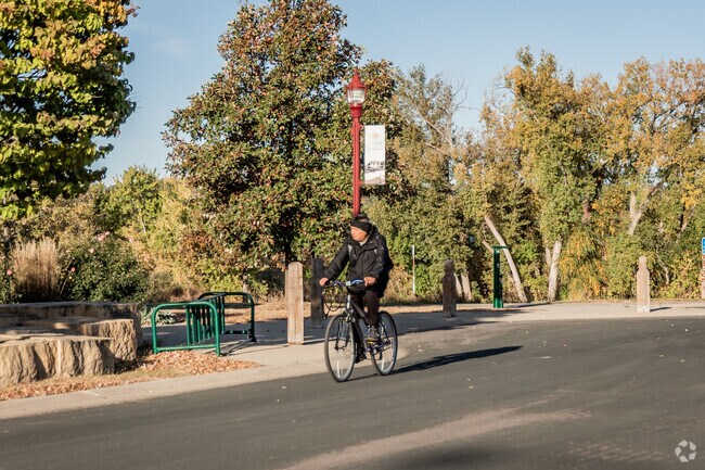 Cyclists can take the scenic route into Old Town via the River Trail in The Prairie.
