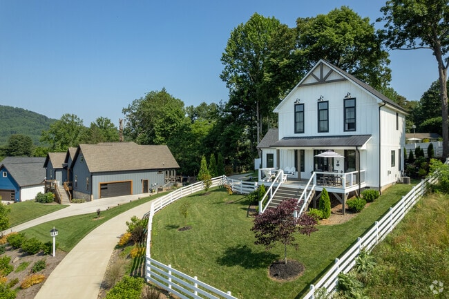 Many homes sit on elevated plots of land in Avery Creek.
