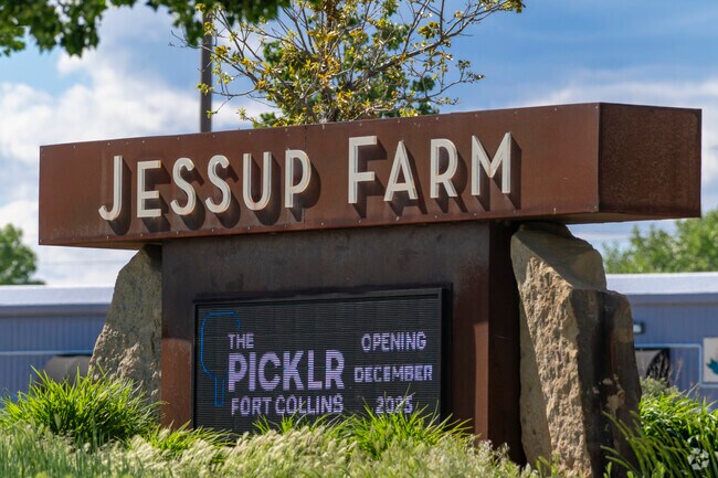 Jessup Farm in Bucking Horse, Colorado blends historic charm with modern life—featuring coffee shops, boutiques, and walkable paths wrapped around old barns and fresh ideas that keep the past alive.