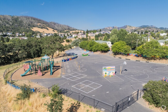 Austin Creek Elementary has a playground and basketball courts.