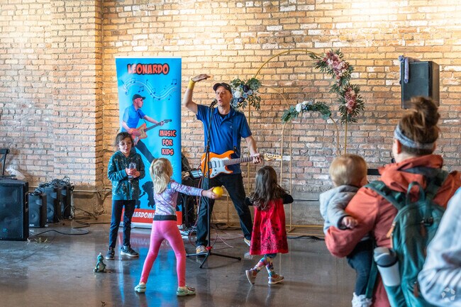 Kids have a blast dancing and singing at Spring Fest at Burning Bush Brewery in Horner Park.