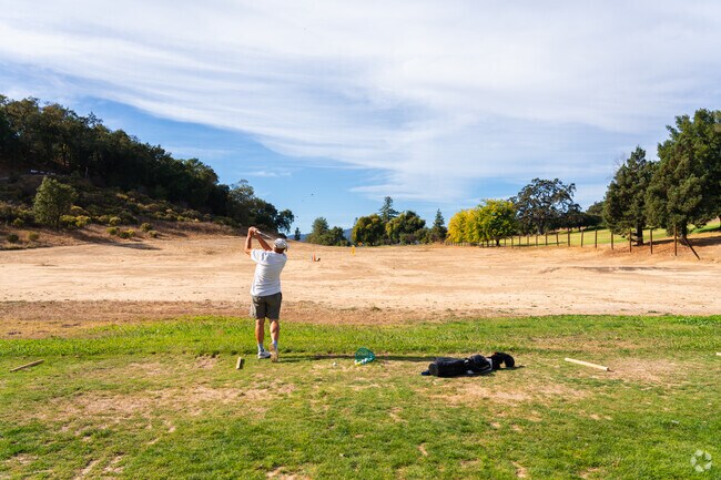 A Golfer practicing his swing at the Gilroy golf course in Las Animas, Gilroy.