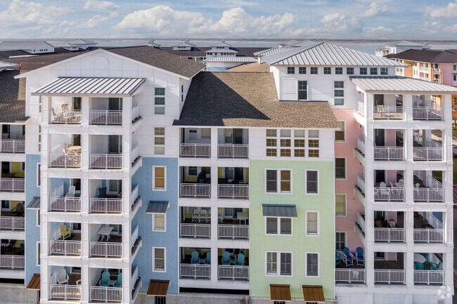 Pastel condos with oceanfront views in the Sandbridge area of Virginia Beach.