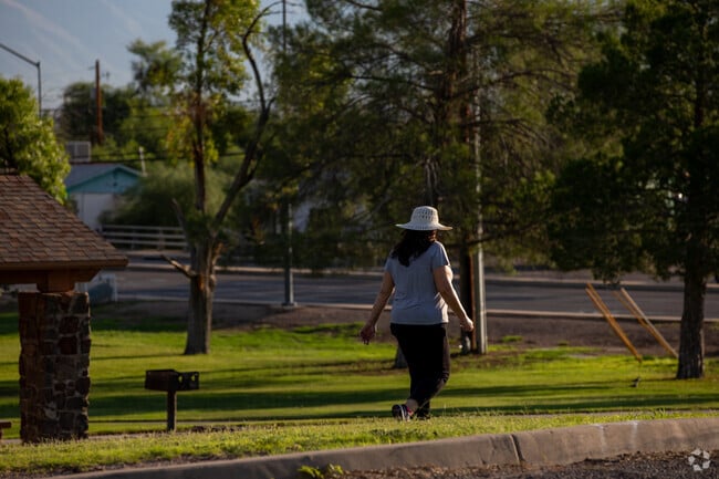 A Westside Development resident enjoys an early morning walk.