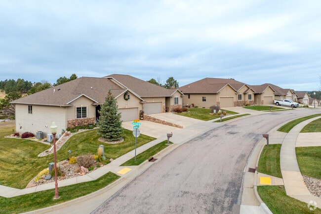 Colonial Pine Hills streets showcase new traditional homes with spacious designs.