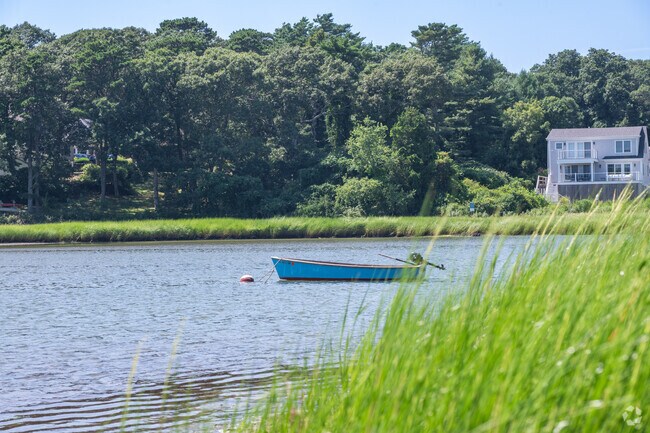 A boat gently sways in the wind in Cataumet.