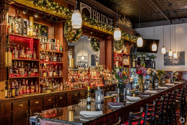 The Bridge offers a refined menu and an impressive bourbon selection, making it a top spot for a night out in Sidney.