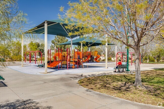 The covered playground at Pioneer Park offers a place to play in the shade.