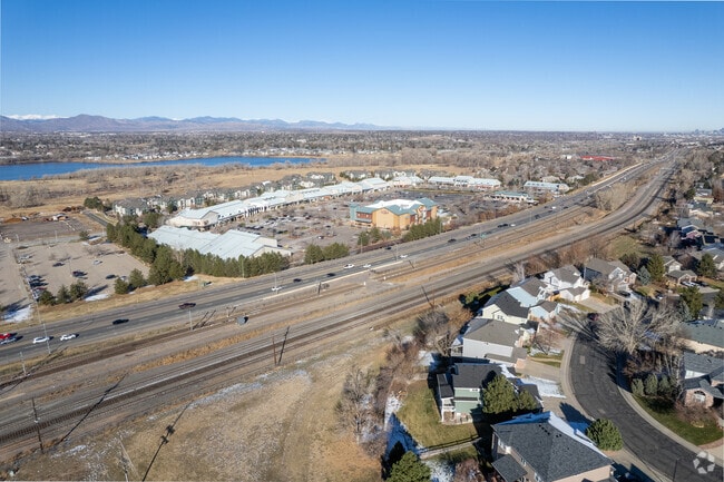 The Heritage neighborhood is literally across the street from the Aspen Grove shopping center.