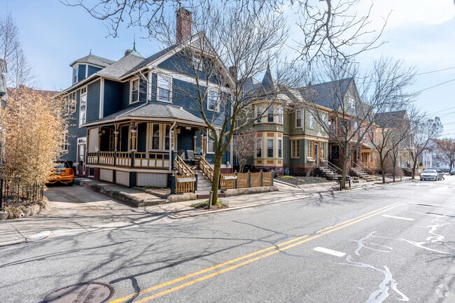 Elaborately adorned Victorian residences line Knight Street in Federal Hill, Providence.