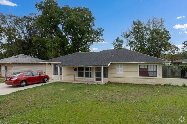 The neighborhood features spacious yards and tree-lined streets.
