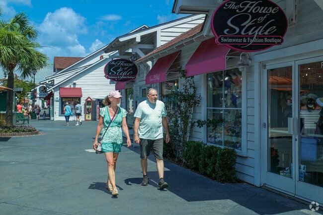 Shoppers enjoy the variety of stores at Broadway at the Beach in Downtown Myrtle Beach.