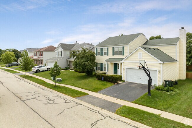 Homes in Hainesville sit safely behind sidewalks.